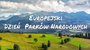 Napis Europejski Dzień Parków Narodowych na tle widoku z lotu ptaka na Tatrzański Park Narodowy